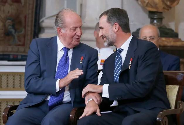 Juan Carlos y Felipe VI.