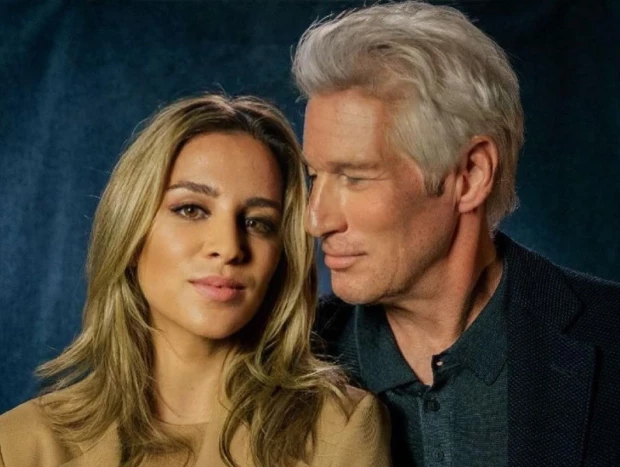 Alejandra Silva y Richard Gere, en su campaña contra la pobreza.