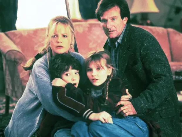 El actor Robin Williams, junto a sus compañeros de rodaje en la película 'Jumanji'