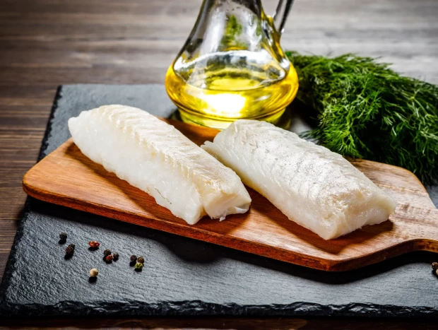 Bacalao confitado con berberechos y anchoas