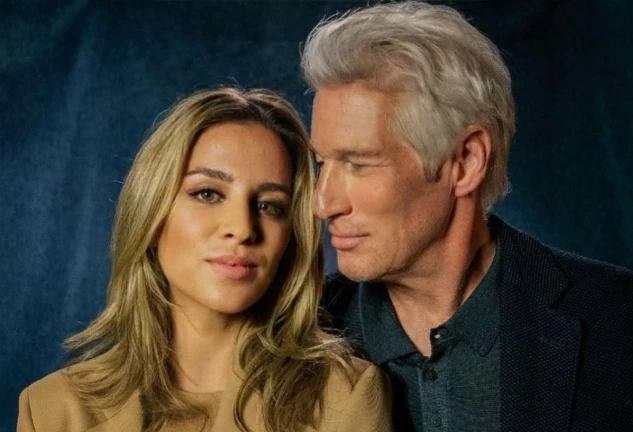 Alejandra Silva y Richard Gere, en su campaña contra la pobreza.