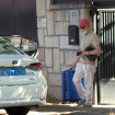 José Ortega Cano, saliendo de su casa con una maleta.