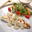 Lubina a la plancha con salsa de alcachofas