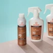 Leche solar en spray con protección alta y efecto bronceado