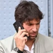 Cayetano Rivera en el Open de Madrid, hablando serio por el móvil