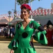 Raquel Bollo con vestido de lunares verde en la Feria de Sevilla de 2022.