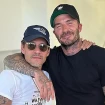 Marc Anthony y David Beckham posando juntos.