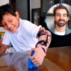 Ingeniero de Ayudame 3D y niño de Gaza utilizando una prótesis para su brazo.