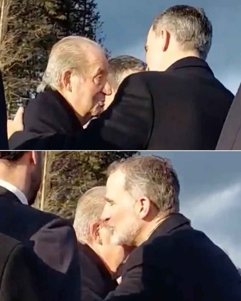 Juan Carlos y Felipe dándose un abrazo.