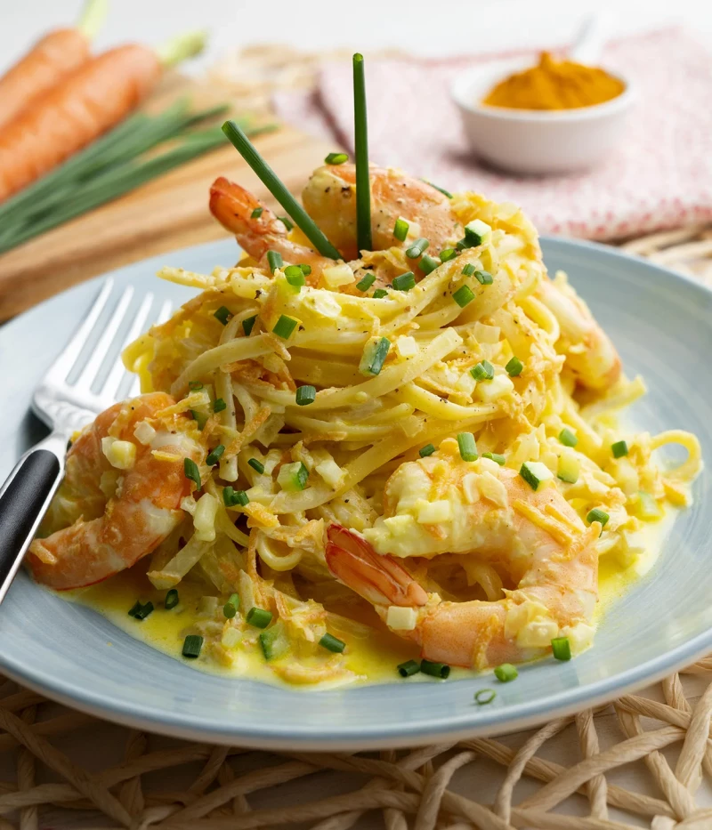Tallarines al curri de langostinos