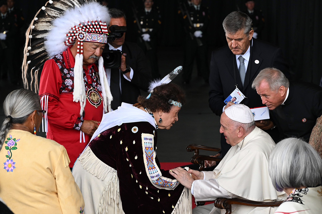 Pope Francis with the natives