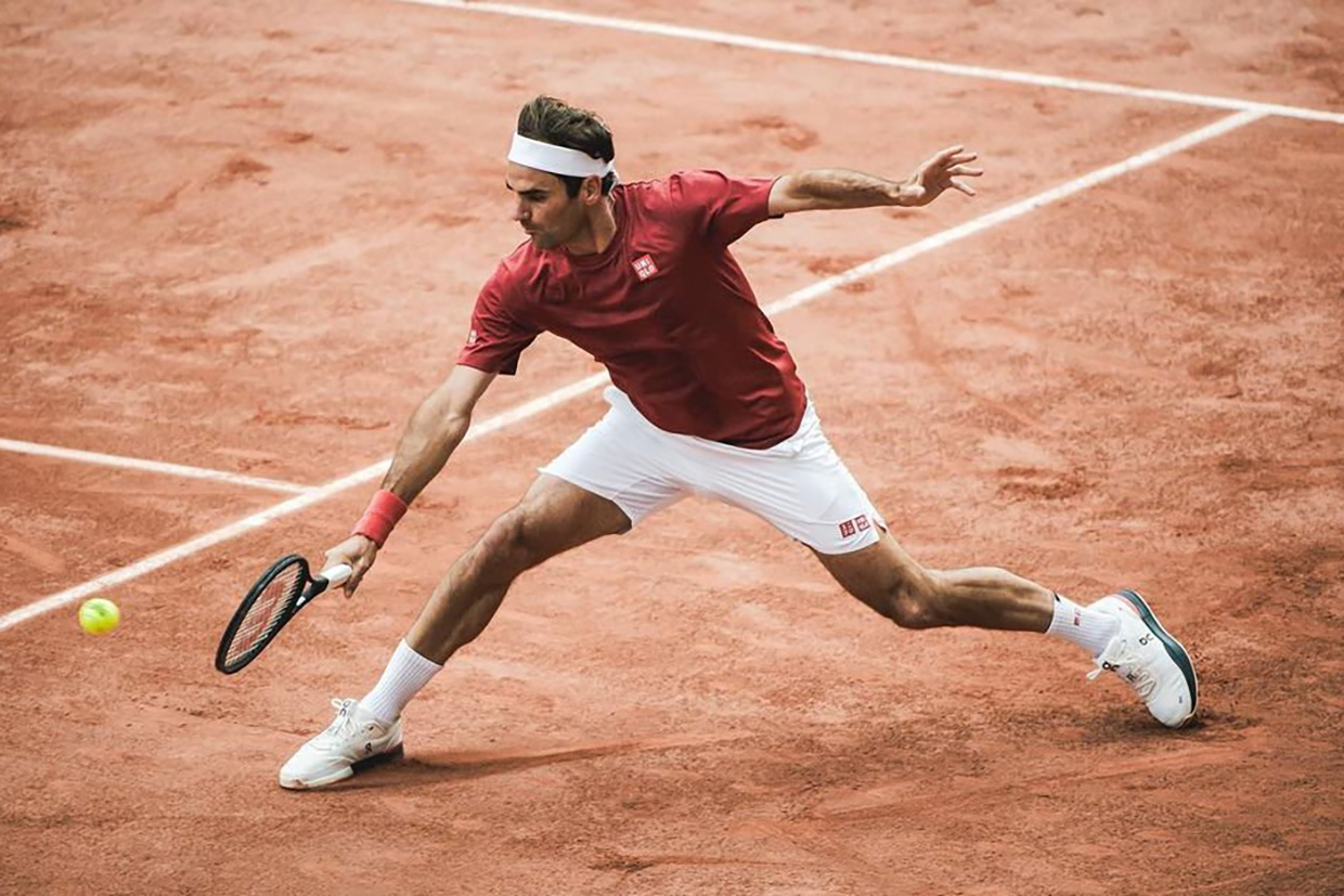 Federer jugando a tenis