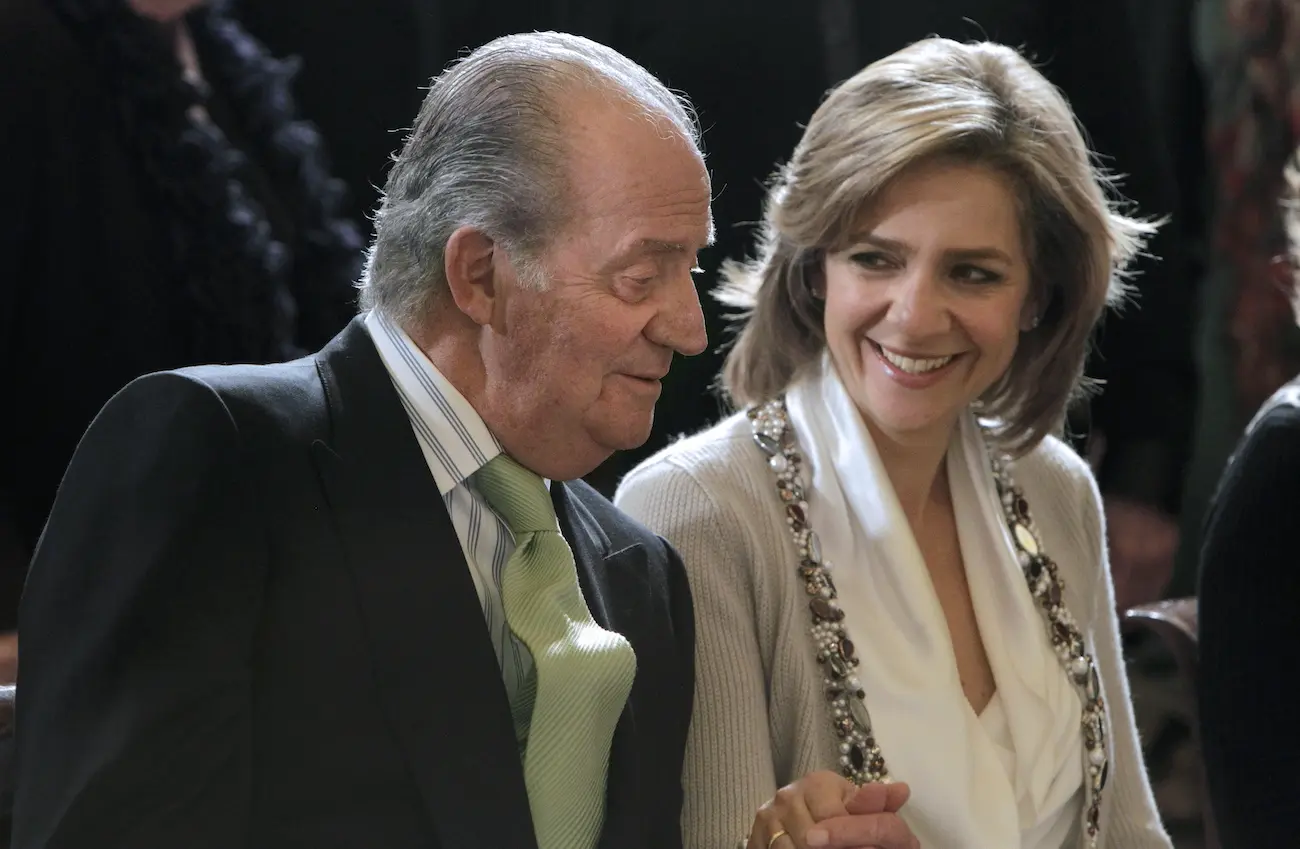 Juan Carlos con su hija Cristina