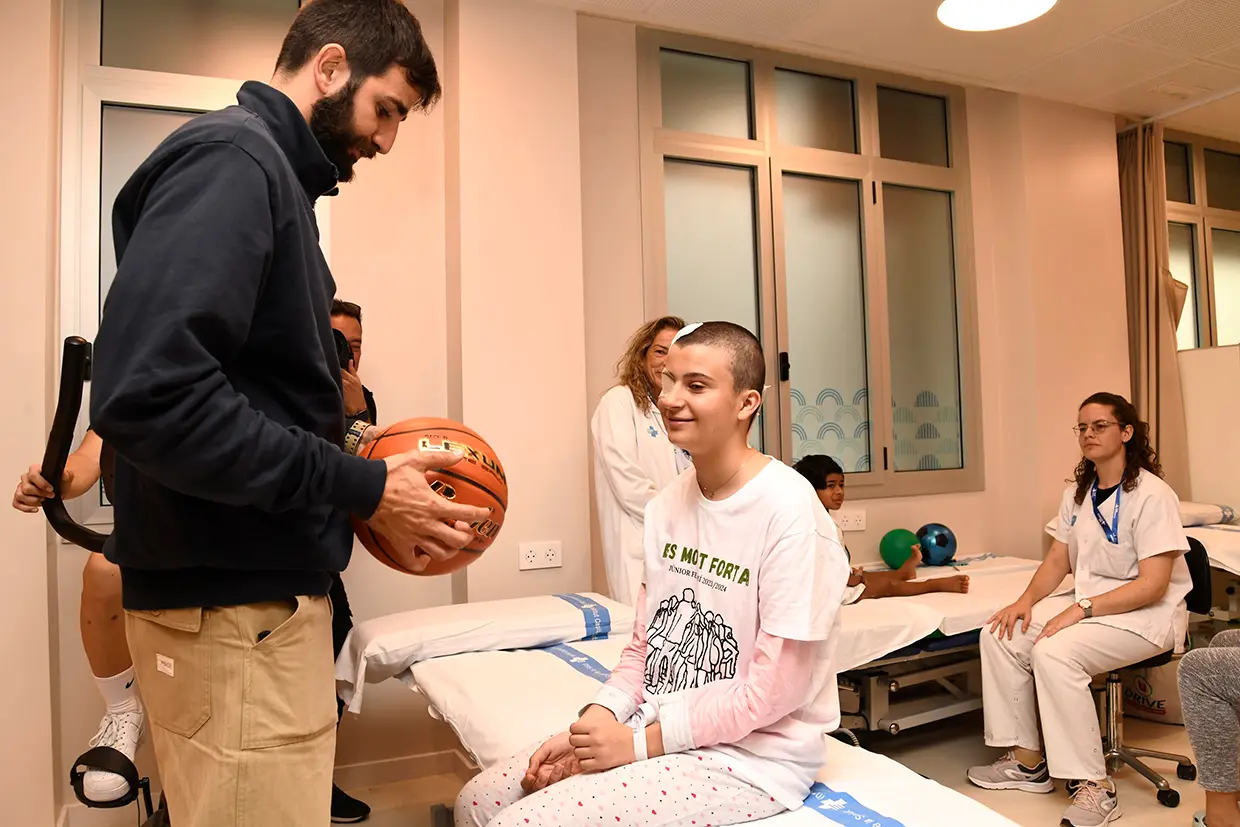 Ricky Rubio con un niño enfermo
