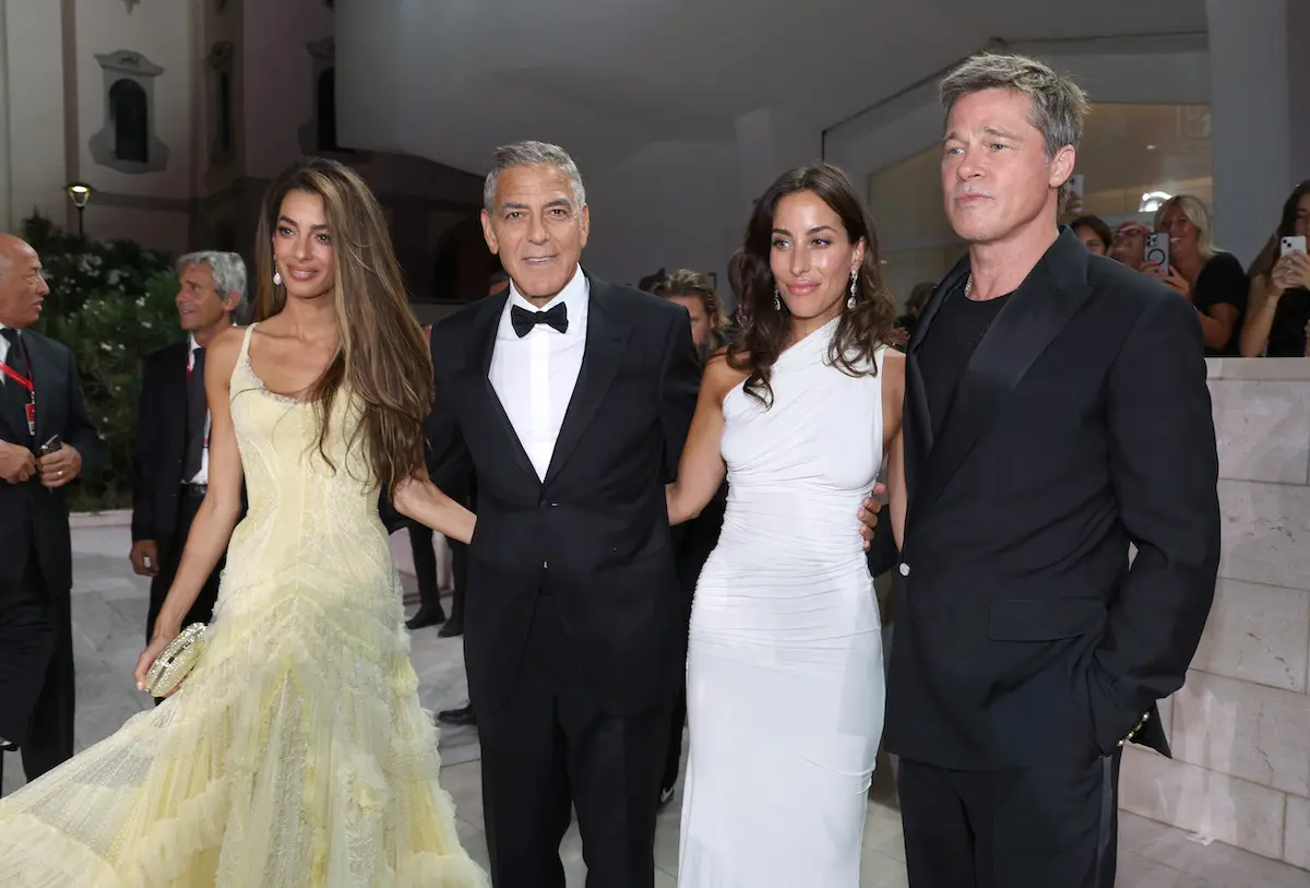 Brad Pitt y George Clooney con sus parejas