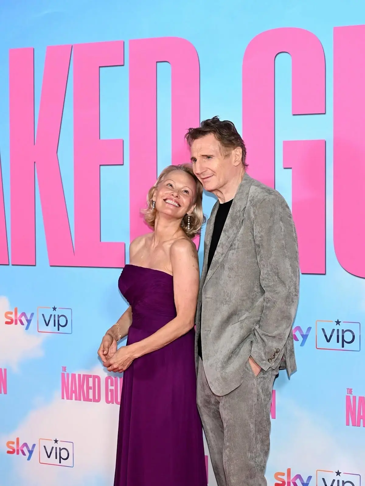 Liam Neeson y Pamela Anderson 4