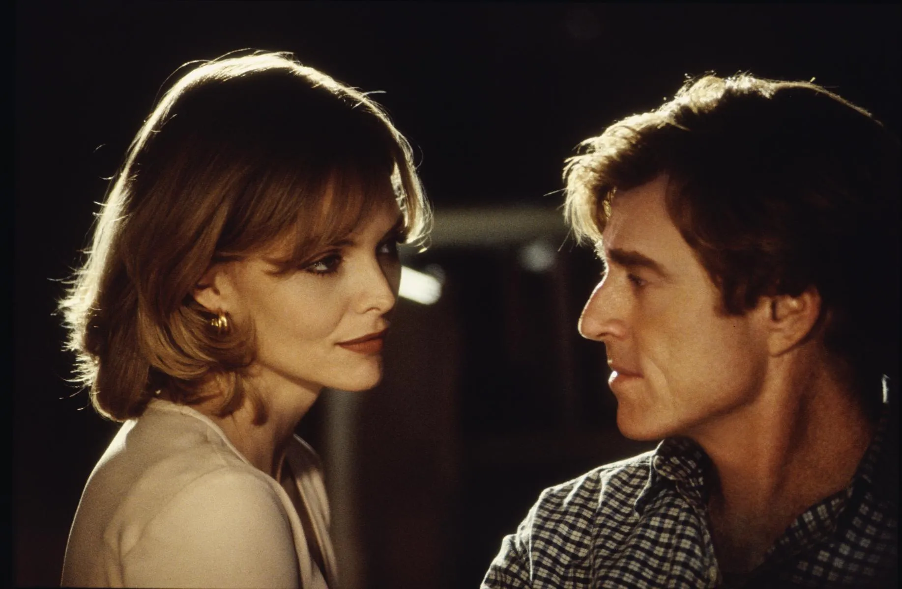 Robert Redford y Michelle Pfeiffer en 'Íntimo y personal'.
