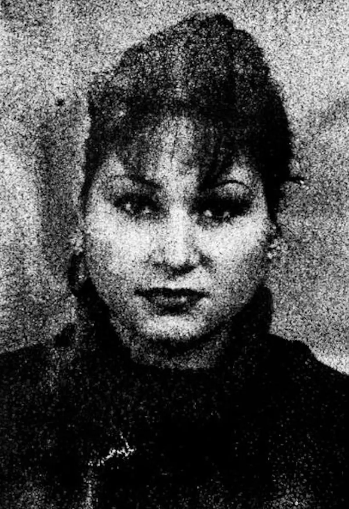 La mujer de rosa